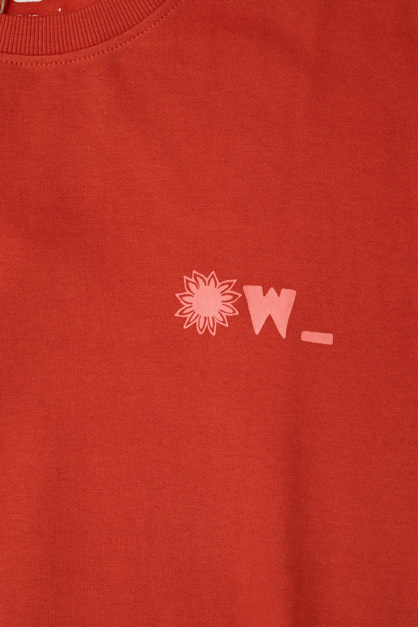 spread your essence sweatshirt in brick red