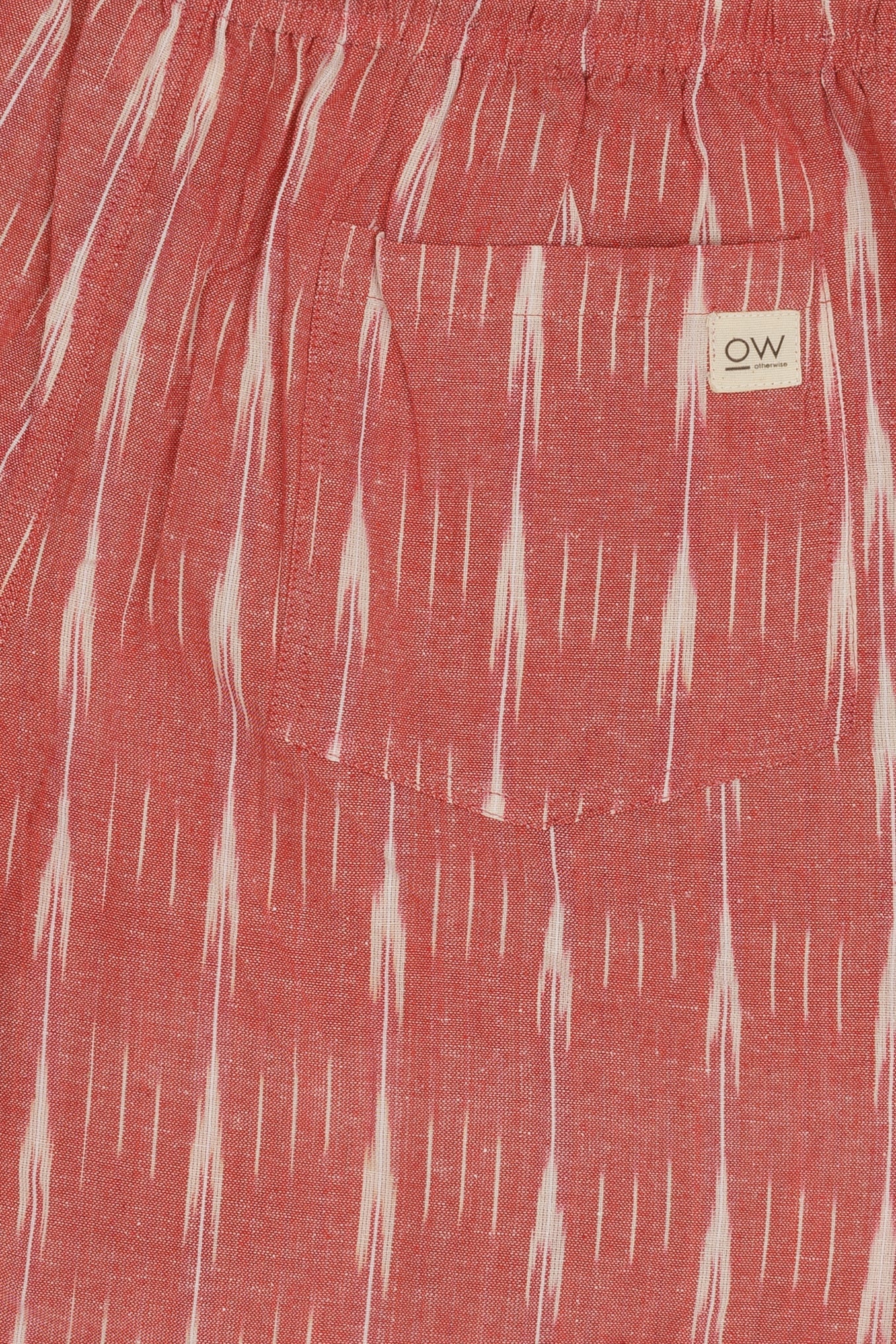 vivid hand-woven shorts in light red
